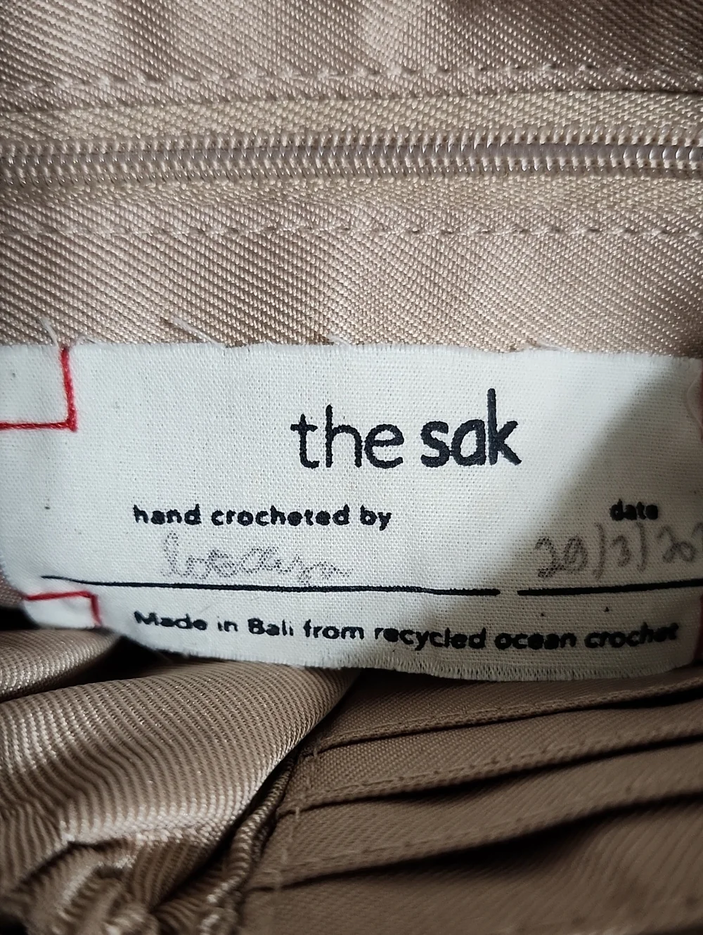 The Sak Navy Crochet Wristlet with Silver Logo Charm, NWT